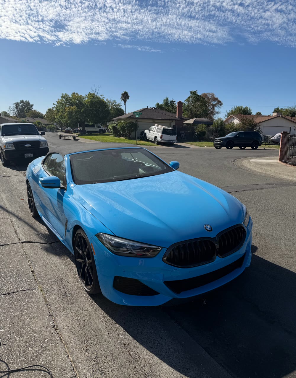 Blue BMW 8 Series convertible before exterior detail